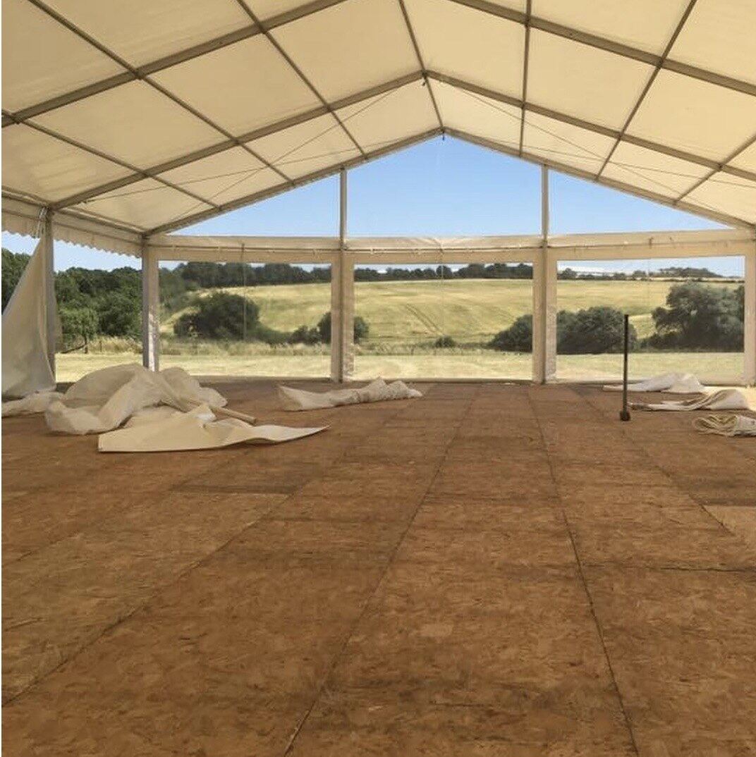 Marquee flooring being installed