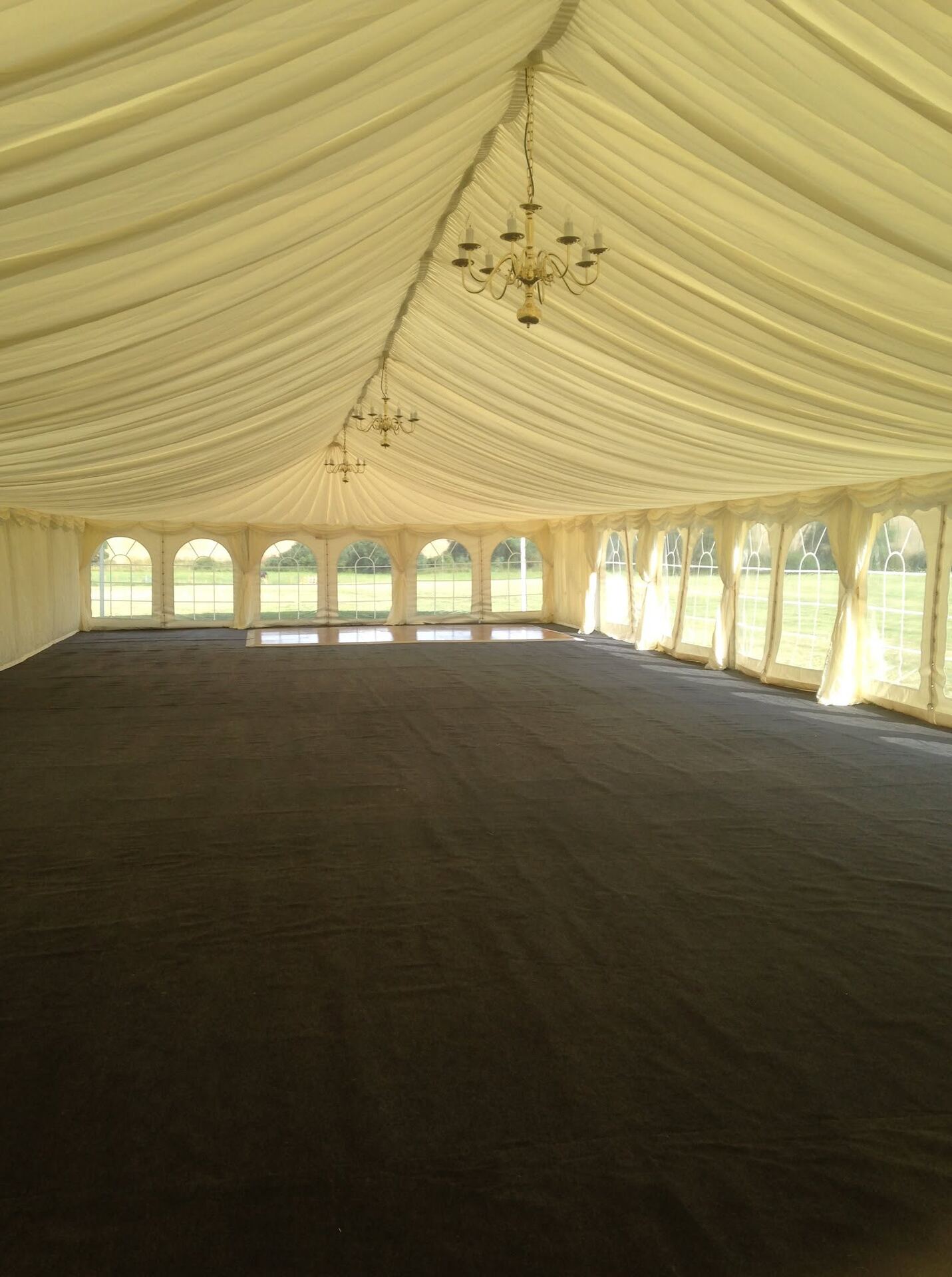 Marquee interior with chandeliers and linings