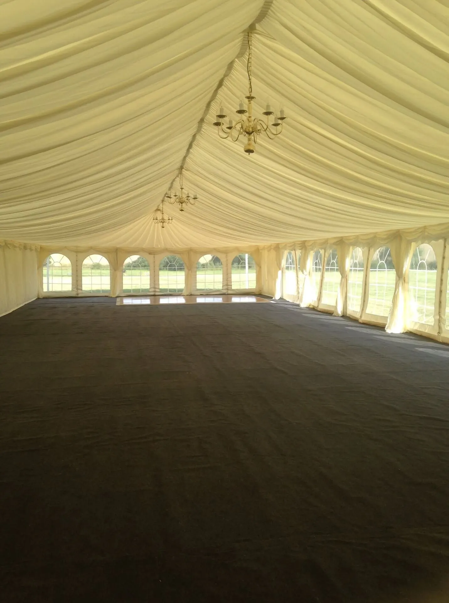 Marquee interior with chandeliers and linings