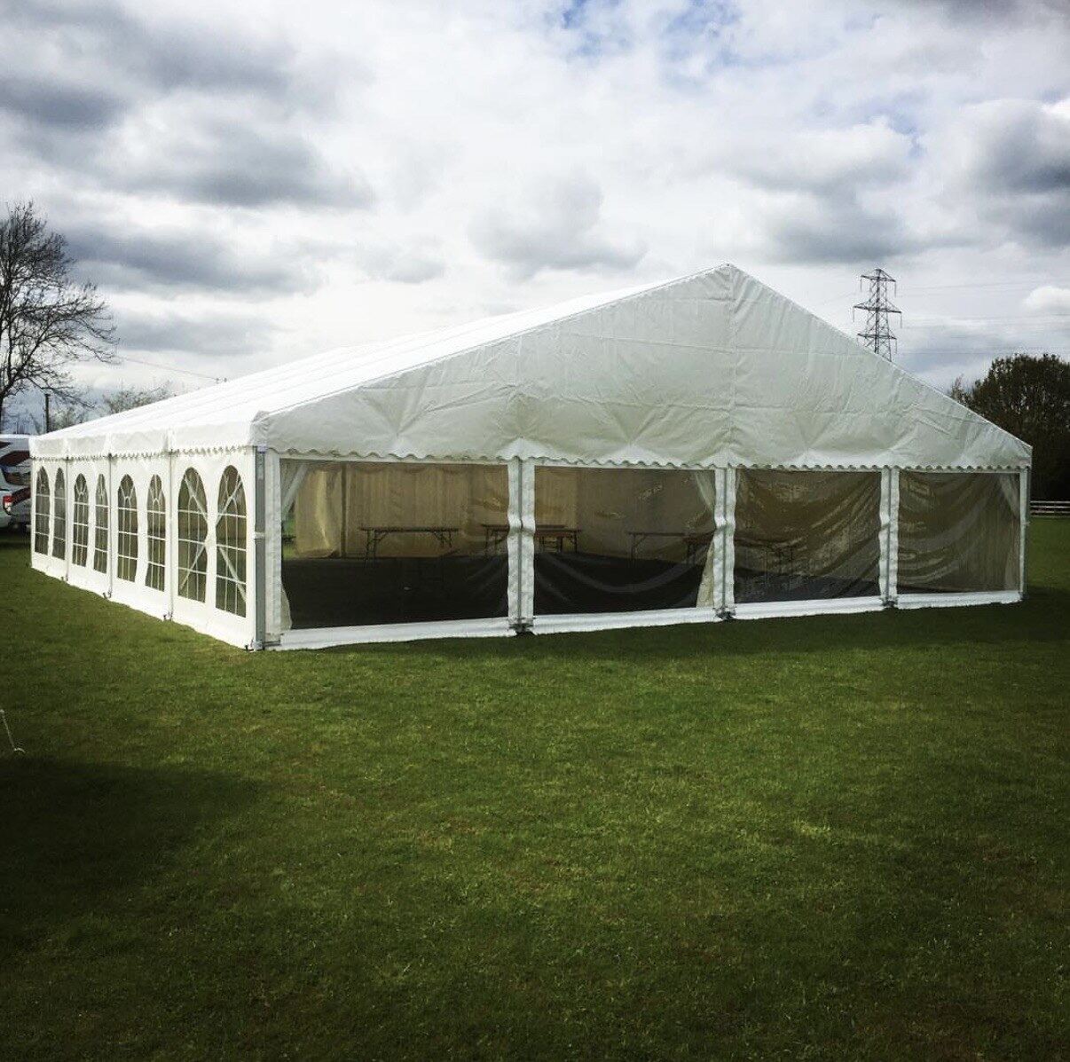 Outdoor event marquee under dramatic sky